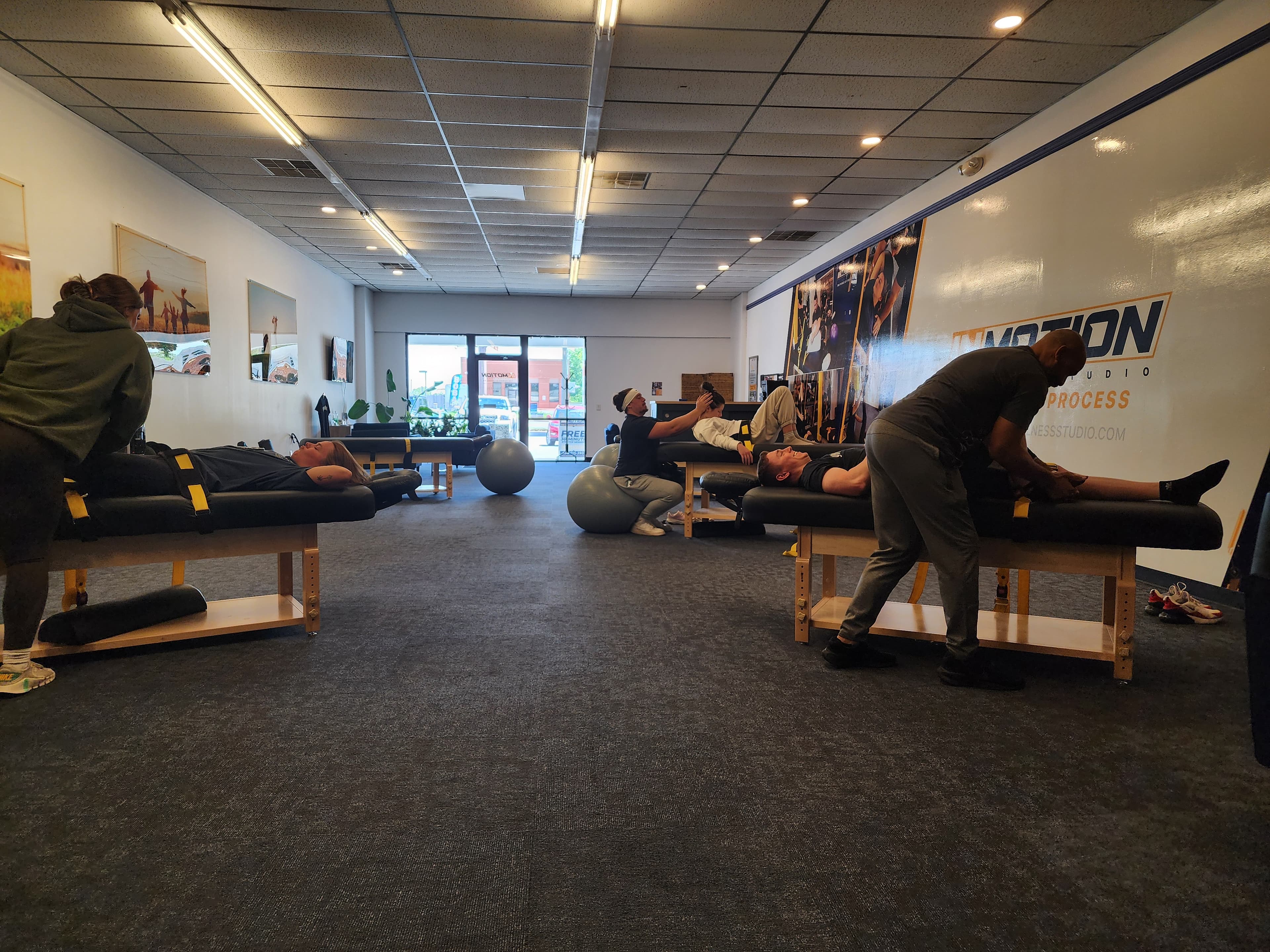 Assisted stretching session at InMotion Wellness Studio Lake Oconee